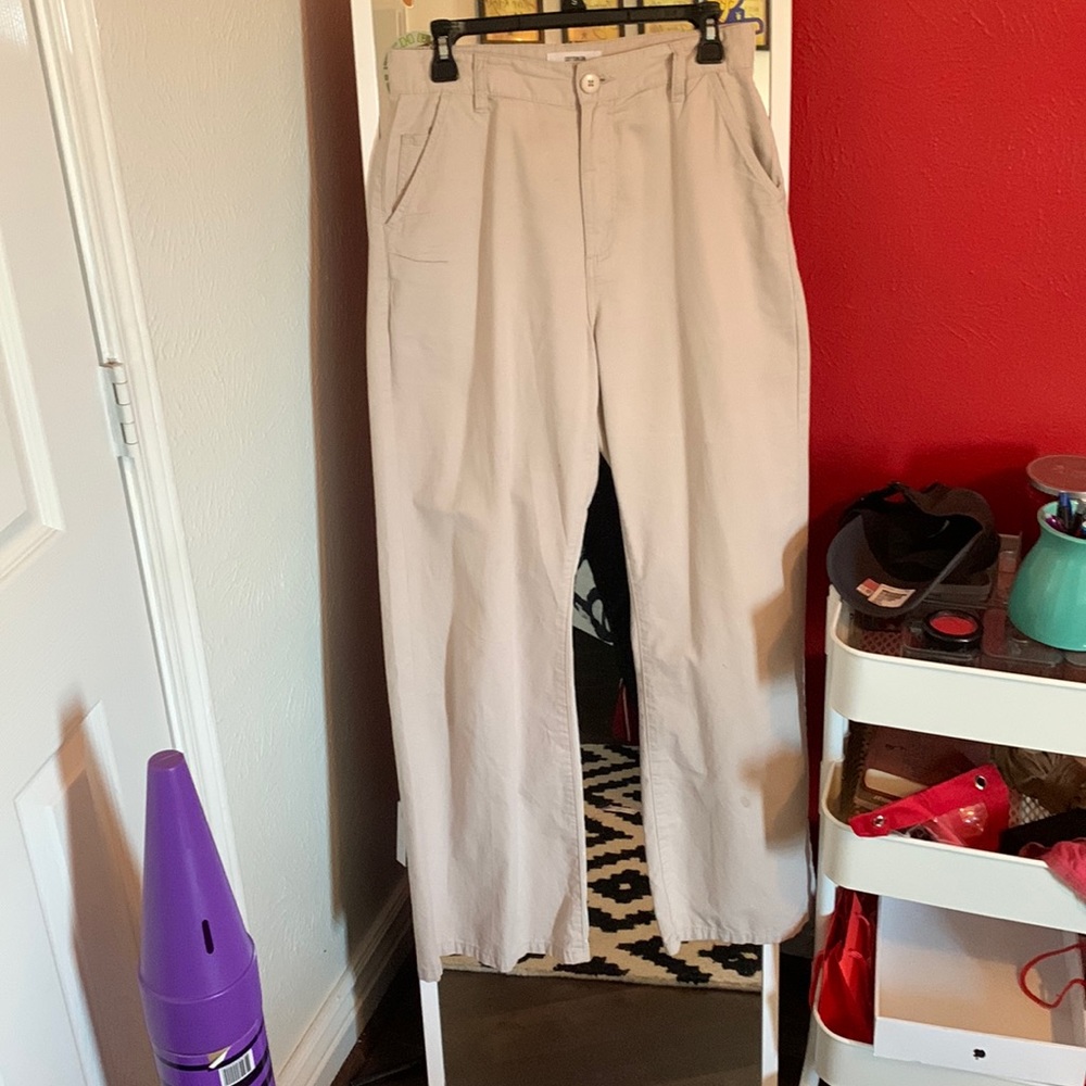 Tan trousers.